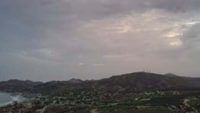 LOS CABOS MEXICO-2020: Camera Slightly Moves Around Above Mountains And A Town