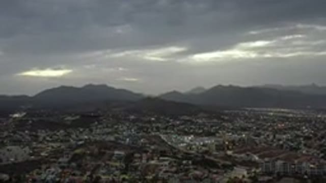 LOS CABOS MEXICO-2020: Mountain Skyline Over A Beautiful Landscape Of Houses And