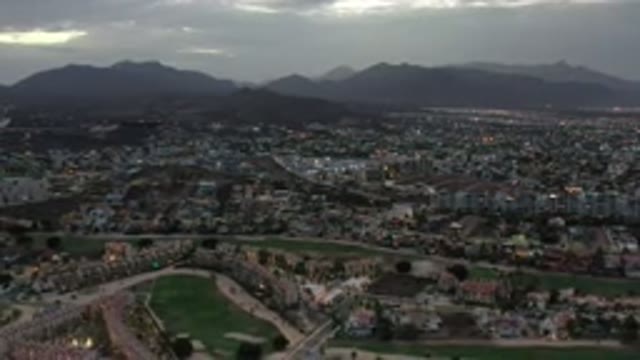 LOS CABOS MEXICO-2020: Dim Large City Hidden Behind The Plains Behind Many