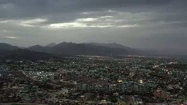 LOS CABOS MEXICO-2020: View Of A City In The Mountains On A Cloudy Day From The