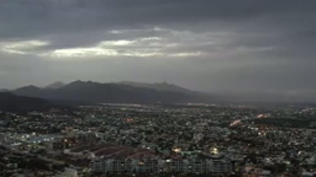 LOS CABOS MEXICO-2020: Cloudy Skies Over A Glowing City Where The Lights Shine