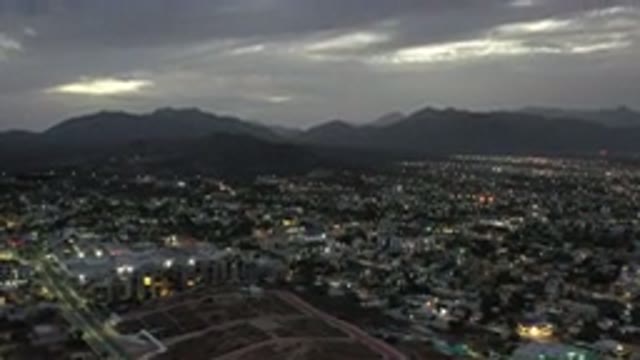 LOS CABOS MEXICO-2020: Drone Footage Of City At Dusk With Mountains And Skyline