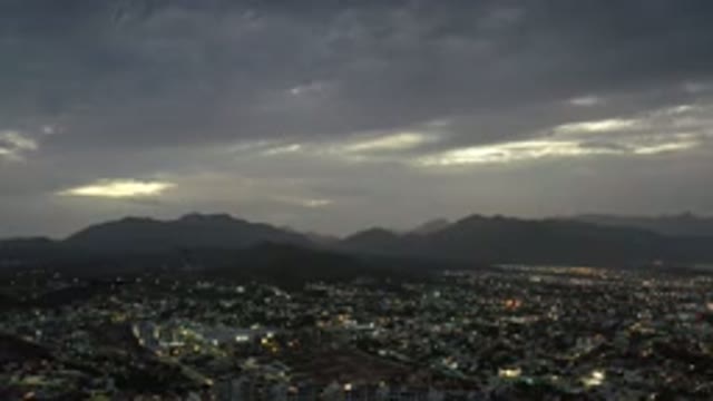 LOS CABOS MEXICO-2020: A Hilltop View of a Vast City with Lights and Dark
