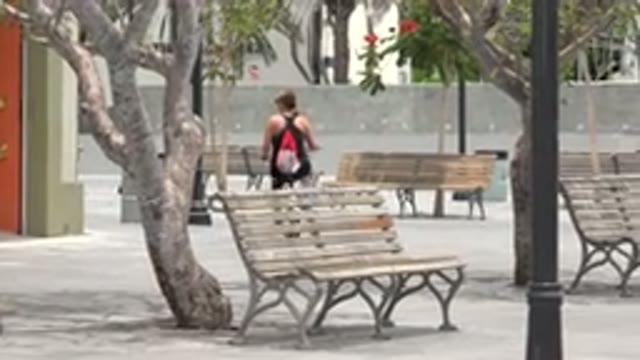 LOS CABOS MEXICO-2020: A Woman Riding A Bicycle In A Park During The Day