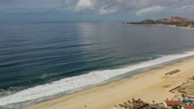 LOS CABOS MEXICO-2020: Exotic Tropical Beach Under Blue Skies Near A Coastal