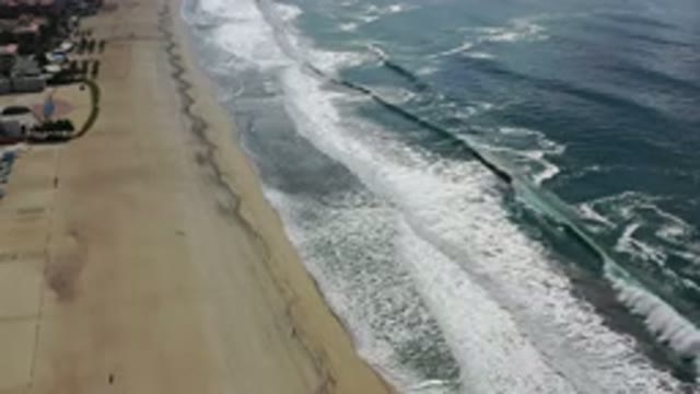 LOS CABOS MEXICO-2020: Ocean Waves Rolling Onto the Beach
