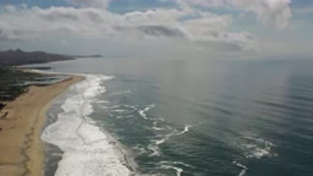 LOS CABOS MEXICO-2020: Waves Coming Towards The Sand In A Unique Aerial View