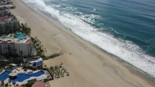 LOS CABOS MEXICO-2020: Buildings Pool Trees Beach Water Waves Sun Sand Houses