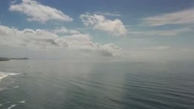 LOS CABOS MEXICO-2020: A Seascape in Late Morning with Choppy Water and Clouds