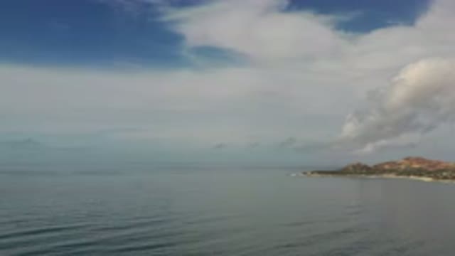 LOS CABOS MEXICO-2020: Island And The Dark Sea With Small Waves