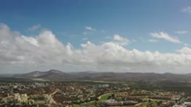 LOS CABOS MEXICO-2020: Aerial View Of A City With Mountains In The Background