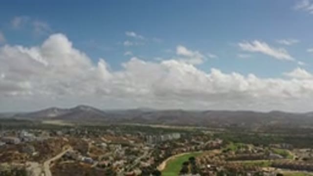 LOS CABOS MEXICO-2020: Clouds-Filled Sky Over Green Grass