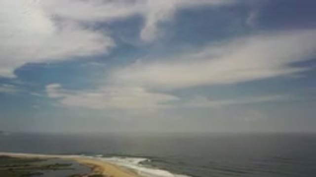 LOS CABOS MEXICO-2020: Aerial View Of Beach With Ocean Waves And Clouds In Blue