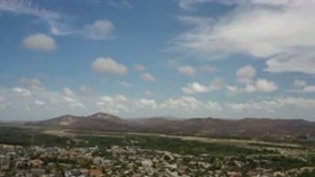 LOS CABOS MEXICO-2020: Blue Sky Covers Beautiful Mountains Above Gorgeous Green