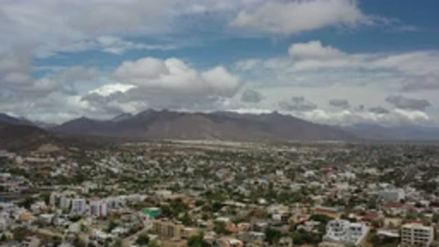 LOS CABOS MEXICO-2020: Aerial View Of A Flat City's Landscape On A Cloudy Day