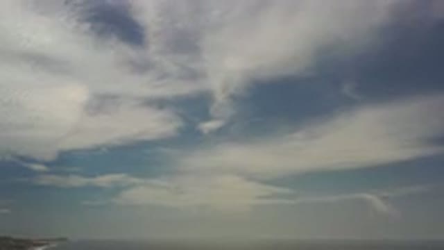 LOS CABOS MEXICO-2020: Camera Panning Across A Bright Clear Blue Sky With Few Clouds