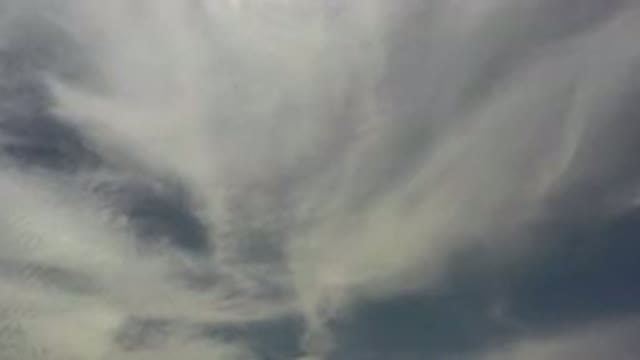 LOS CABOS MEXICO-2020: Peaceful White And Fluffy Clouds Floating Through A Blue Sky