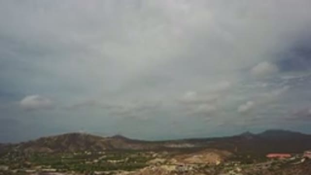 LOS CABOS MEXICO-2020: Above The Landscape See The Blue Sky Covered With White