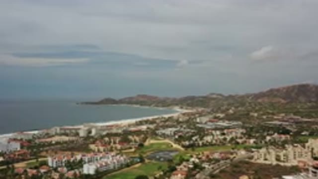 LOS CABOS MEXICO-2020: An Aerial View Of A Coastal Town In The Summer As Waves