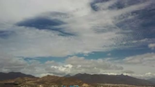 LOS CABOS MEXICO-2020: Beautiful Blue Sky With Wide Huge Clouds Above Multiple Mountains