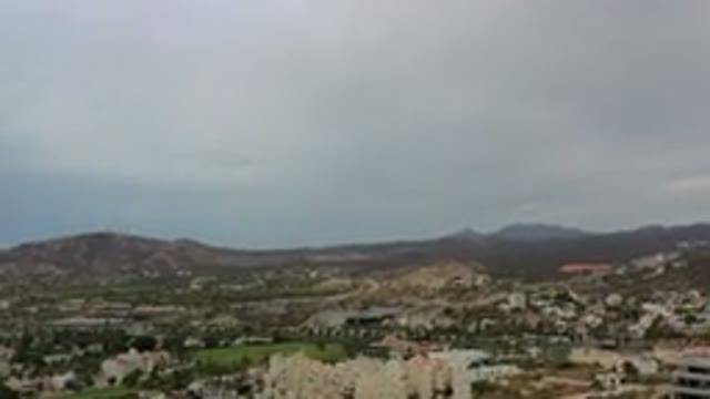 LOS CABOS MEXICO-2020: Aerial View Of Green Mountains And The Beautiful Blue Sky