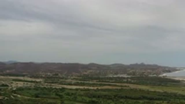 LOS CABOS MEXICO-2020: Uninhabited Area Next To The Ocean With Green Fields And Hilly Terrain