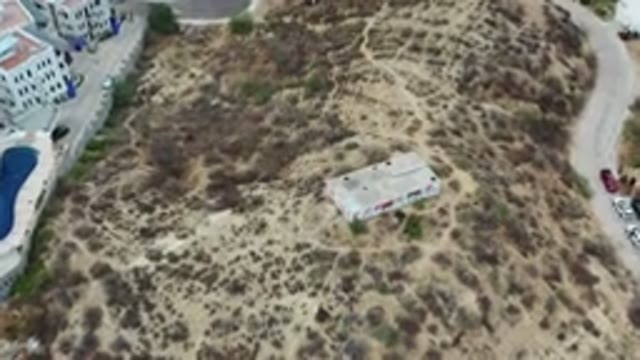 LOS CABOS MEXICO-2020: House On A Dirt Hill Located In A Suburban Area