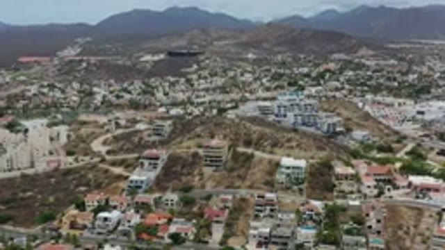 LOS CABOS MEXICO-2020: Aerial View Of City With Buildings And Mountains In The