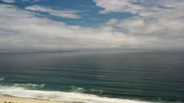LOS CABOS MEXICO-2020: An Aerial View Of A Sea With A Blue Sky Full Of Clouds On