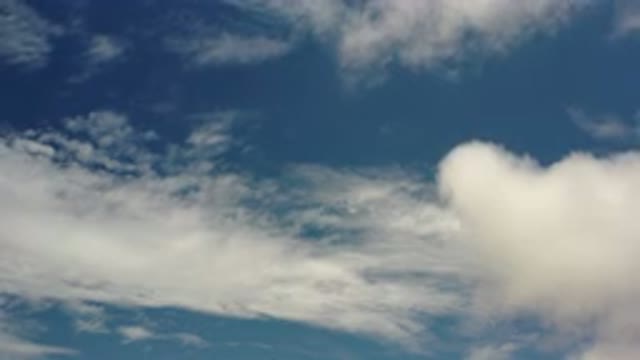 LOS CABOS MEXICO-2020: White Clouds Slowly Float Across The Blue Sky