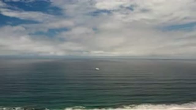 LOS CABOS MEXICO-2020: Open Ocean Waters Crashing Under Beautiful Blue Sky