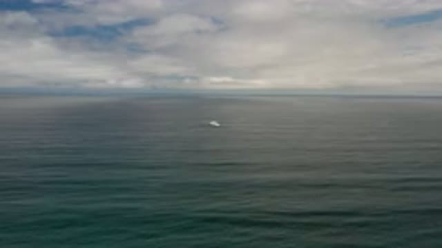 LOS CABOS MEXICO-2020: Blue and Gray Sky Over Calm Ocean with Wild Nature