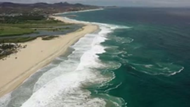 LOS CABOS MEXICO-2020: Aerial View Of Ocean Waves And Tropical Beach