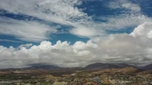 LOS CABOS MEXICO-2020: Beautiful View Of Fluffy Clouds In The Sky Over Mountains