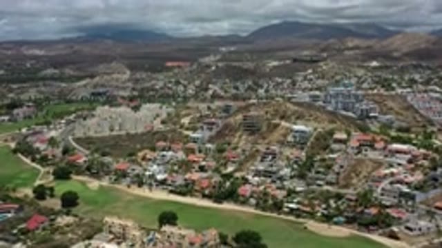 LOS CABOS MEXICO-2020: Aerial Footage Panning Off In The Distance Of A Large