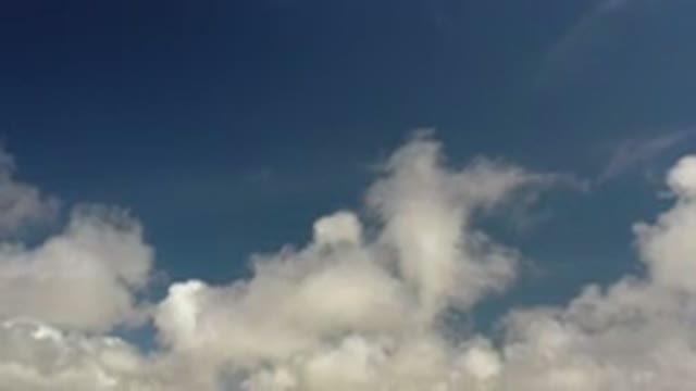 LOS CABOS MEXICO-2020: Panning Down View Of A Blue Sky With White Clouds On Top