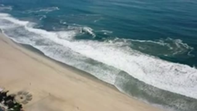 LOS CABOS MEXICO-2020: Beautiful Drone Shot Of The Clean Blue Ocean Waters