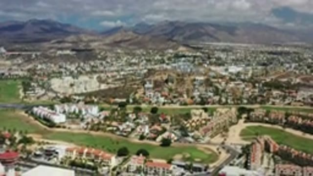 LOS CABOS MEXICO-2020: City Top View And Hill Sight With Clouds In Sky And