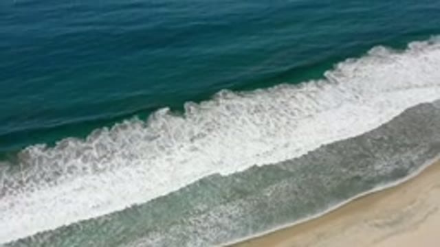LOS CABOS MEXICO-2020: Ocean Waves Crash Onto Pristine Sandy Beach Devoid Of Any