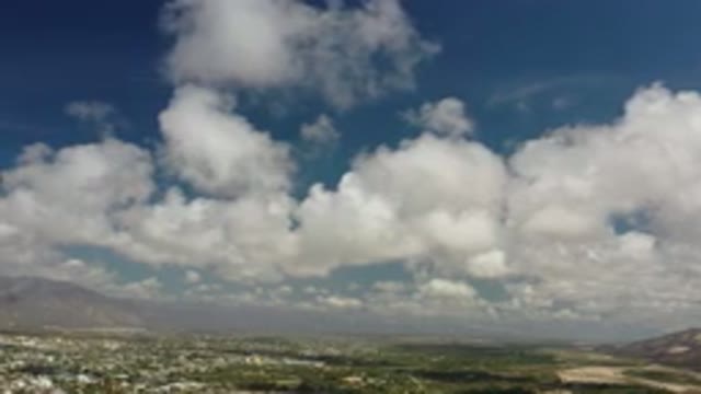 LOS CABOS MEXICO-2020: Gentle Clouds Over A Pleasant Valley With A Deep Blue Sky