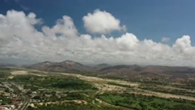 LOS CABOS MEXICO-2020: Clouds Mountains Sky View Farm Country Trees Skydiving
