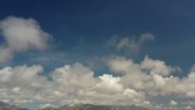 LOS CABOS MEXICO-2020: View Of Clouds Mountains And City Panning Down And To The