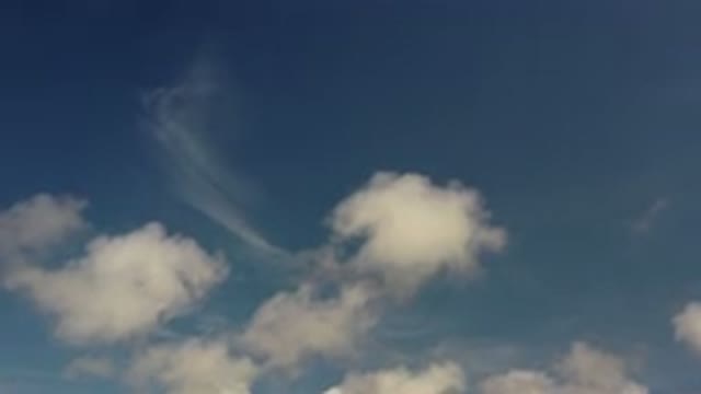 LOS CABOS MEXICO-2020: Puffy White Clouds And A Few Streaked Clouds Fill A Blue