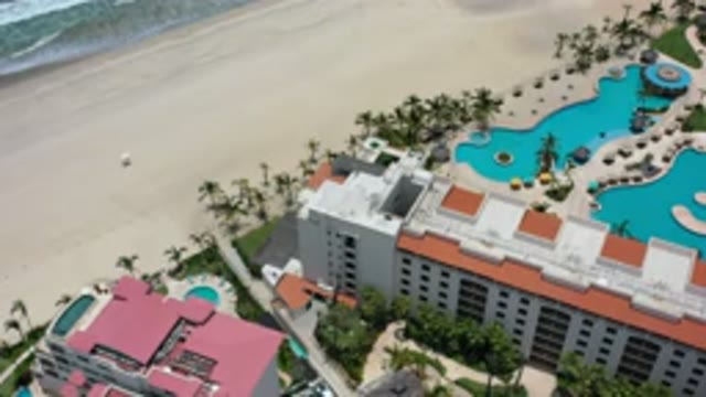 LOS CABOS MEXICO-2020: Beach Building Sea Water Sand Hotel Pool Blue Water Guest