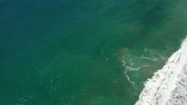 LOS CABOS MEXICO-2020: Aerial View Of An Ocean With Small Waves Crashing On The Shore