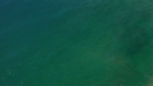 LOS CABOS MEXICO-2020: Drone Shot Of A Calm Blue To Green Gradient Ocean