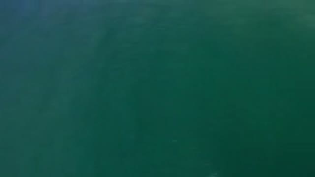 LOS CABOS MEXICO-2020: Sparkling Open Blue And Green Sea Just Off Shore With Breaking Waves