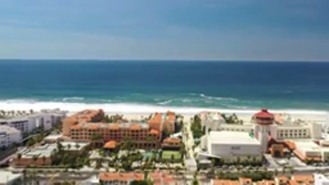 LOS CABOS MEXICO-2020: Aerial View Of Modern Town Moving Close To The Beautiful Beachfront