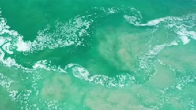 LOS CABOS MEXICO-2020: Clear Ocean Waves With Sea Foam On Top