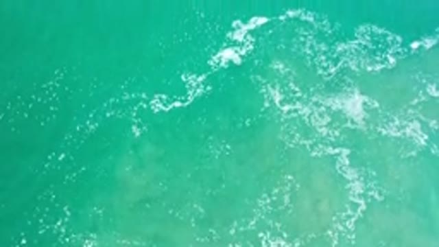 LOS CABOS MEXICO-2020: Green Sea And White Crested Ocean Waves Windblown In The